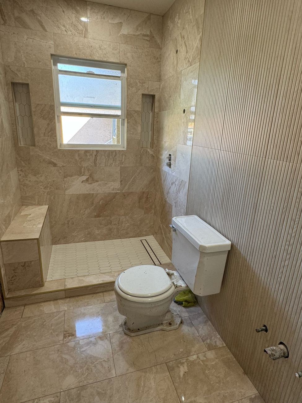 Shower renovation mid-construction by Green Rise Builders