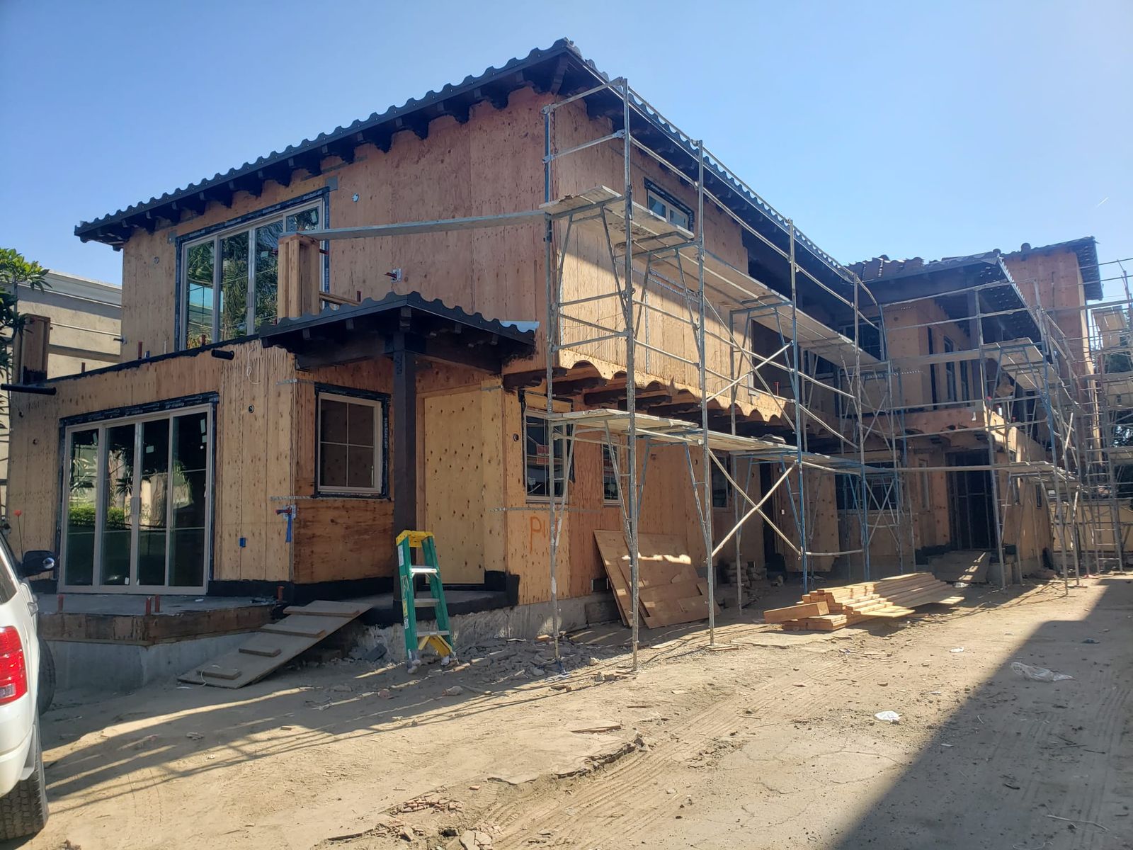 Active roofing and construction jobsite managed by Green Rise Builders